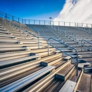 Premium Retractable Indoor Bleacher System with Natural Timber Benches and Folding Guardrails