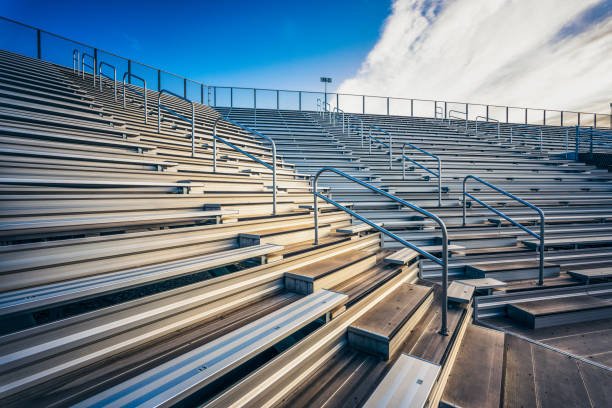 Premium Retractable Indoor Bleacher System with Natural Timber Benches and Folding Guardrails